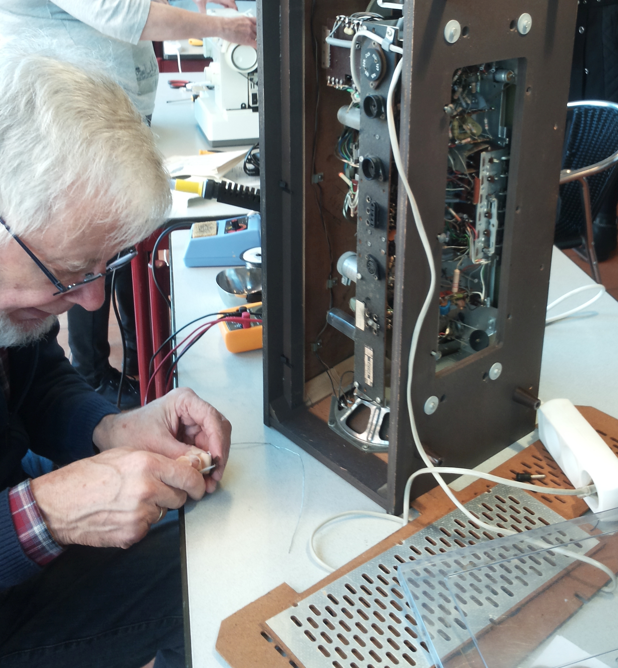 Peter working on a tube radio